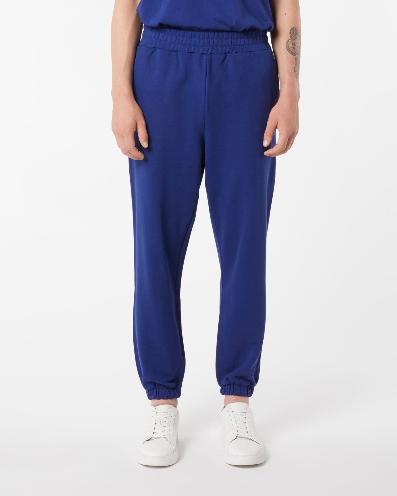 BLUE PANTS WITH BLUE EMBROIDERED LOGO