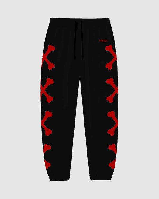 BLACK PANTS WITH RED CROSS BONES