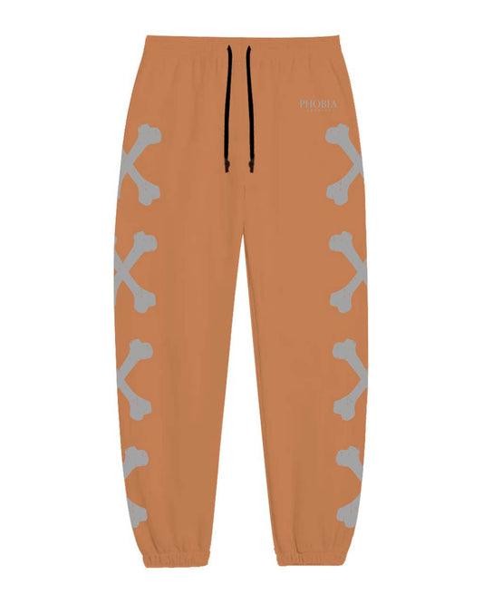 TERRACOTTA PANTS WITH GREY CROSS BONES