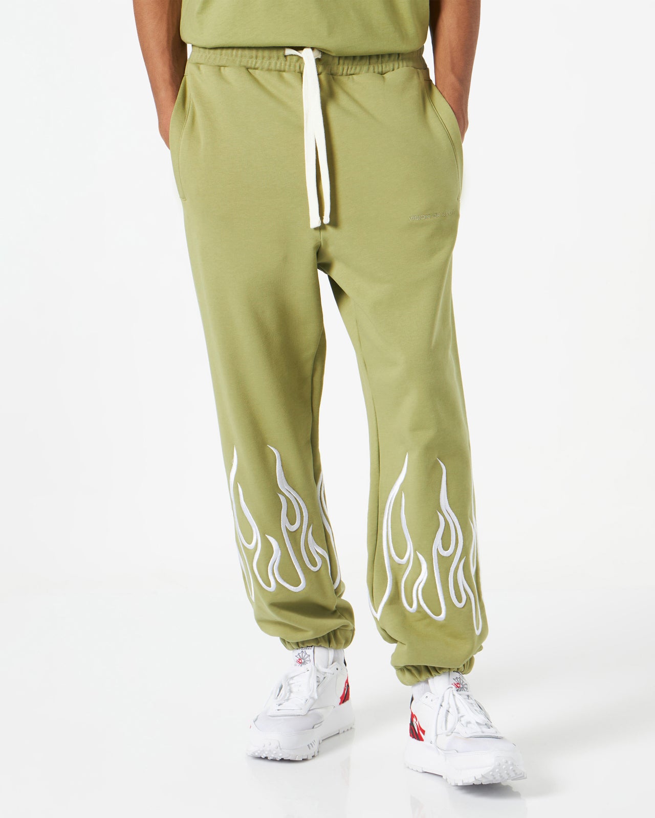 GREEN PANTS WITH EMBROIDERY FLAME