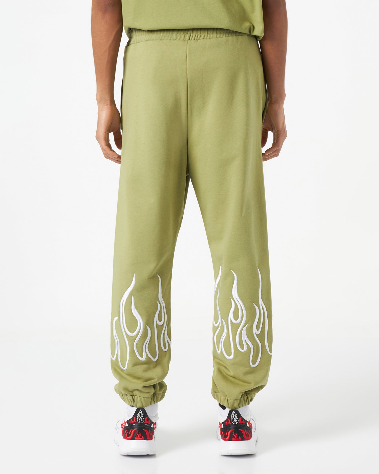 GREEN PANTS WITH EMBROIDERY FLAME